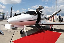 Cirrus Vision SF50 with cabin door open, at the 2019 European Business Aviation Convention EBACE 2019, Le Grand-Saconnex (EB190470).jpg