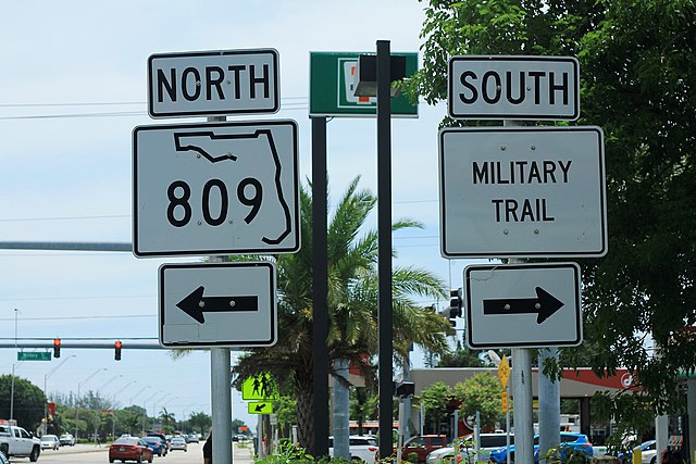 Signage along Lake Worth (SR 802) Road showing the transition of Military Trail to SR 809)
