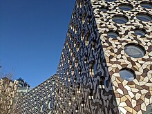 The Moussavi building used a metal cladding using mathematical patterning in a spiral Farshid Moussavi Building.jpg