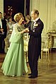 First Lady Betty Ford Dancing with Prince Philip of Great Britain in the State Dining Room during a State Dinner Honoring Queen Elizabeth II and Prince Philip - NARA - 23869227.jpg