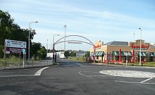 The gated archway at the entrance to Glanford Park on Jack Brownsword Way. Football and fast food - geograph.org.uk - 847925.jpg