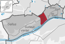 Kaart met de wijk (in rood) binnen de gemeente (in donkergrijs) en de rest van de stad (in lichtgrijs)