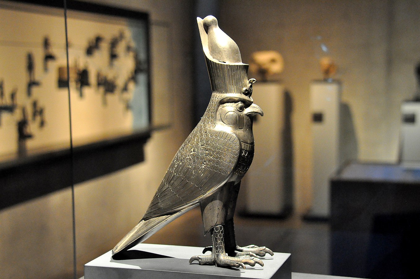 cult image of Horus as a falcon wearing the double crown