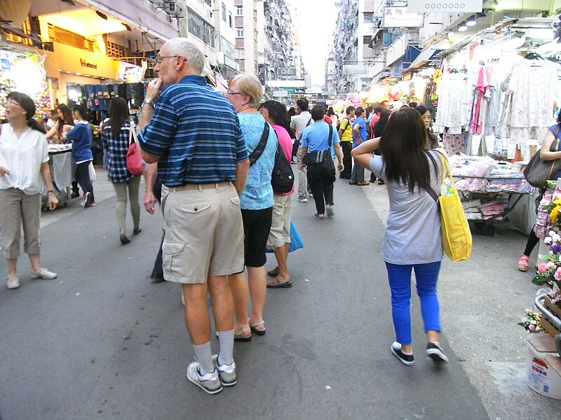 File:HK Mong Kok Fa Yuen Street evening wide walkway n stalls n visitors Sept-2012.JPG