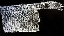 Igbo-ukwu 9th century textile associated with copper chain with weave pattern and selvedge. Igbo Isaiah a shrine.png
