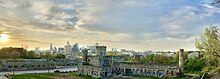 The workhouse castle, with abandoned city offices across Vine St, overlooking downtown KC KC Workhouse Castle landscape sunset 2020.jpg