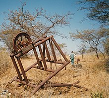 Headframe with gin wheel. Abandoned Kilimafeza gold mine, Serengeti NP, Tanzania Kilimafeza001.jpg