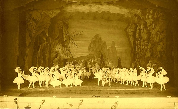 Marius Petipa's final revival of La Bayadère, with the stage of the Mariinsky Theatre shown in the scene The Kingdom of the Shades. In the center is M