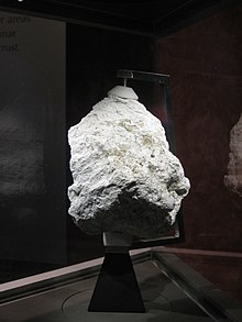 Lunar ferroan anorthosite (plagioclase feldspar) collected by Apollo 16 astronauts from the Lunar Highlands near Descartes Crater Lunar Ferroan Anorthosite (60025).jpg