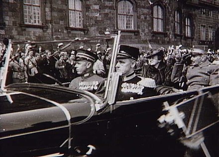The King and Queen arriving at Christiansborg Palace in Copenhagen on 9 May 1945 at the first opening of Parliament following the end of Nazi Germany's occupation of Denmark.