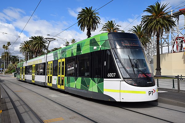 Melbourne E-Class Tram. The Melbourne tram network is the largest in the world, with 250 km (160 mi) of track.