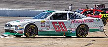 Krispy Kreme sponsorship on a NASCAR vehicle NASCAR 88 Earnhardt Jr., Gordon RIR-2 (29507869642) (cropped).jpg