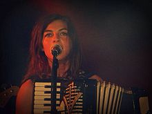 Tena performing in 2013
