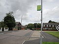 The bus stop at Mayfield Drive, Newport, Isle of Wight in September 2011. It is served by Southern Vectis buses on route 39. At the time, Southern Vectis had only recently started running the route, having been previously operated by Wightbus, and so just a basic bus stop flag was out with no route details.