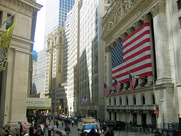 The New York Stock Exchange Building's Broad Street entrance (right) as seen from Wall Street, April 2005. 23 Wall Street, the former headquarters of 