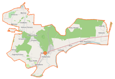 Mapa konturowa gminy Pomiechówek, blisko centrum na dole znajduje się punkt z opisem „Dzieło D-8punkt oporu Nr 8 (Twierdza Modlin)”