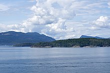 Portland Island with the Salt Spring Island at the background Portland Island and Saltspring Island from Swartz Bay.jpg