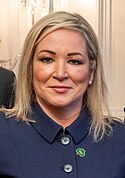 President Joe Biden greets U.S. Special Envoy to Northern Ireland for Economic Affairs Joseph Kennedy III, Northern Ireland First Minister Michelle O'Neill and Deputy First Minister Emma Little-Pengelly on March 17, 2024 (cropped).jpg