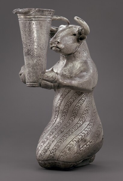 Kneeling Bull with Vessel. Kneeling bull holding a spouted vessel, Proto-Elamite period, (3100–2900 BC)