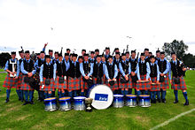 The Grade 3 band at the World Pipe Band Championships in Glasgow, 2012 RMM3 celebrates first at the Worlds (8485453285).jpg