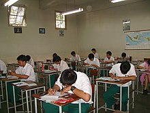 Indonesian students taking a written test SMATrinitasUlum.JPG