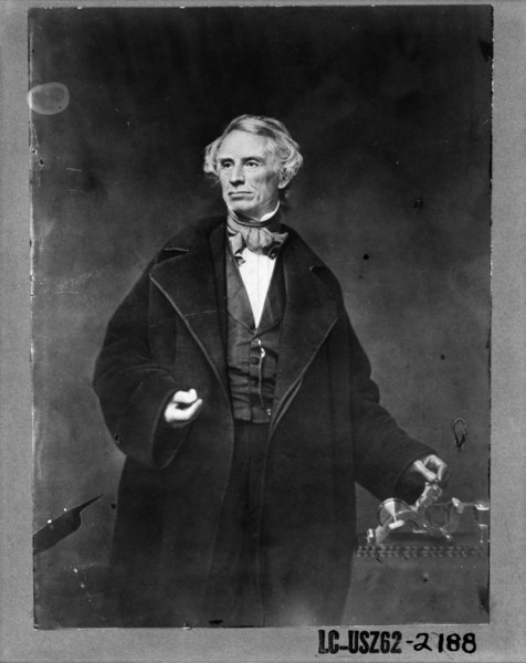 File:Samuel F.B. Morse, half-length portrait, posing with left hand on a telegraph apparatus, facing slightly left LCCN2001700118.tif