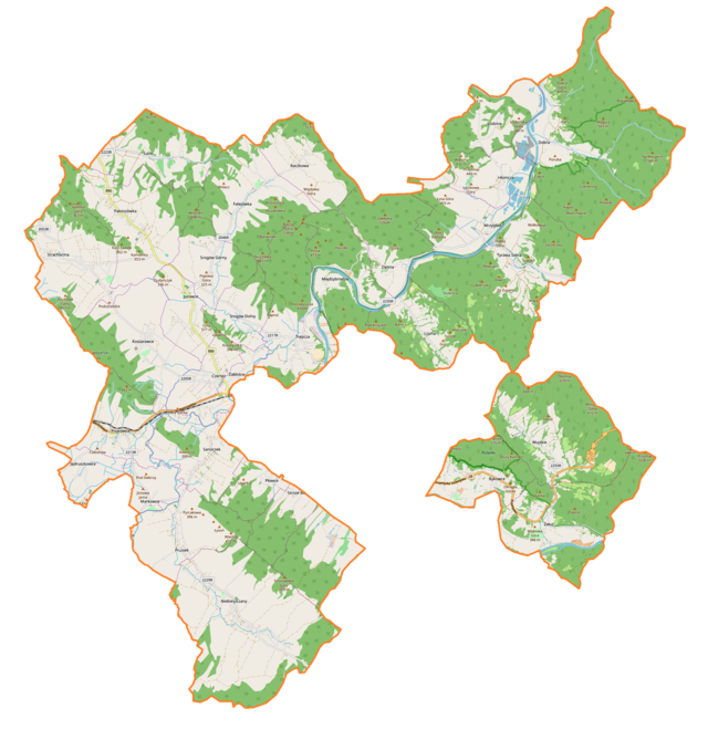 Mapa konturowa gminy wiejskiej Sanok, blisko lewej krawiędzi nieco u góry znajduje się punkt z opisem „źródło”, natomiast blisko centrum na lewo znajduje się punkt z opisem „ujście”