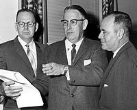 Johns Committee namesake and chairman Charley Johns (center) discusses plans to screen out homosexuals from employment in state government and colleges with B. R. Tilley (left), President of St. Johns River Junior College at Palatka, and A. E. Mikell (right), superintendent of the Levy County schools, 1963 Senator Johns discusses plans 1963.jpg