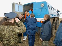 Astronaut Edward T. Lu, having landed with Soyuz TMA-2, is being recovered with a ZIL-49061 vehicle. Soyuz TMA-2 - Edward T. Lu.jpg