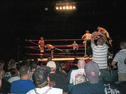The Spirit Squad wrestling against D-Generation X in a handicap match at a house show