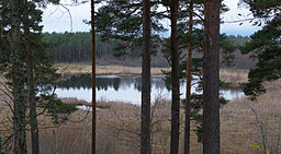 Tacktorpssjön sedd från området med fritidshus som ligger på östra sidan.