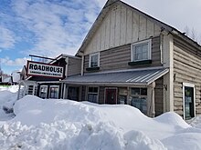 Talkeetna Roadhouse, made of log construction in 1917, features an inn, bakery, and restaurant Talkeetna Roadhouse Alaska AK inn bakery and restaurant.jpg