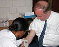 Man giving blood for an AIDS test