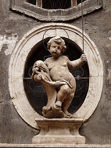 Statue of Simon of Trent, an Italian child whose disappearance and death was blamed on the leaders of the city's Jewish community Trento-statue of Simon of Trent in via Simonino.jpg