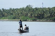 Fishermen at Sasihitlu in Dakshina Kannada Two men in a boat.jpg