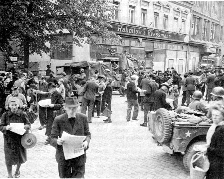 File:US-Army distributing german-language newspaper.jpg