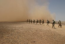 The opening scene depicts a fire fight during the Gulf War. A desert area one hour outside of Los Angeles stood in for Iraq, and the scene featured actual U.S. military personnel as extras (U.S. Marines in Iraq pictured). US-Marines-Iraq.jpg