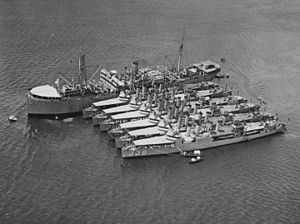 USS Altair (AD-11) moored in Pearl Harbor with destroyers on 8 February 1925.jpg