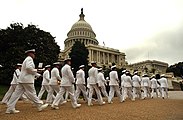 The United States Navy Ceremonial Band marching into position during a 2004 departure ceremony held at the United States Capitol Building during the state funeral of Ronald Reagan in 2004.