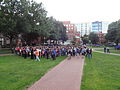 A side angle view of the Wikimania 2012 group shot of all attendees taken immediately after the closing ceremony. Taken about 15-30 seconds after the last professional photograph taken from the ladder.