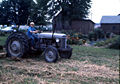 McCool driving a tractor