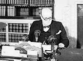 Churchill at a BBC microphone about to broadcast to the nation on the afternoon of VE Day, 8 May 1945. Winston Churchill at a BBC microphone about to broadcast to the nation on the afternoon of VE Day, 8 May 1945. H41843.jpg