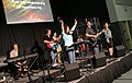 A modern Protestant worship band leading a contemporary worship session.