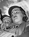 (right) face detail, from- Dick Bass with members of the Fort Wayne Daisies baseball team- Opa-locka, Florida (3253307090) (cropped).jpg