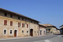 Mereto di Capitolo, casa Boga e villa Morelli de Rossi