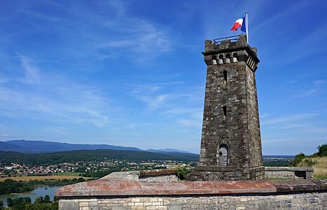 Miotte fortifications and tower with landscape and sky.