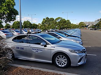 A line of parked Silver Service taxis 2020-04-11 Grounded taxi fleet in Sydney during COVID-19 pandemic.jpg