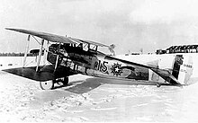 Post-Armistice photo of squadron aircraft 15 in the snow at Souilly Aerodrome, France. 22d Aero Squadron SPAD S.XIII.jpg