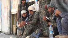 YPG and FSA fighters in Tell Abyad, June 2015 ASL et YPG Tall Abyad juin 2015.PNG