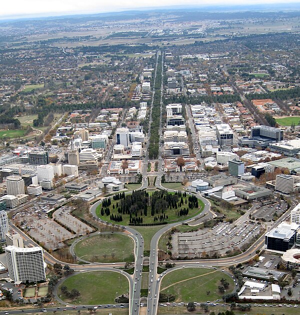 Aerial view of Northbourne Avenue, 2009, before construction of the light rail. Seen looking north from Civic, with City Hill in the foreground.